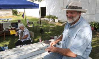 Learning to play spoons at Murray County Fair